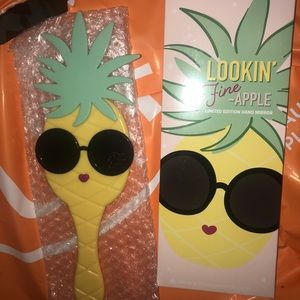 Too faced looking like a fine Apple hand mirror